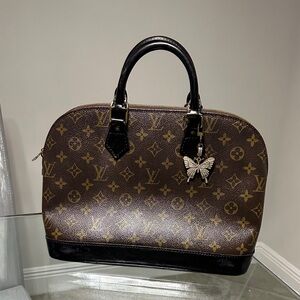 Louis Vuitton Alma Brown Monogram Handbag
